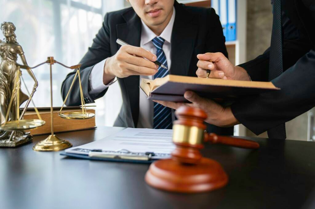 Lawyer or judge discussing legal matters in a client's trial at a lawyer's office, litigation consul